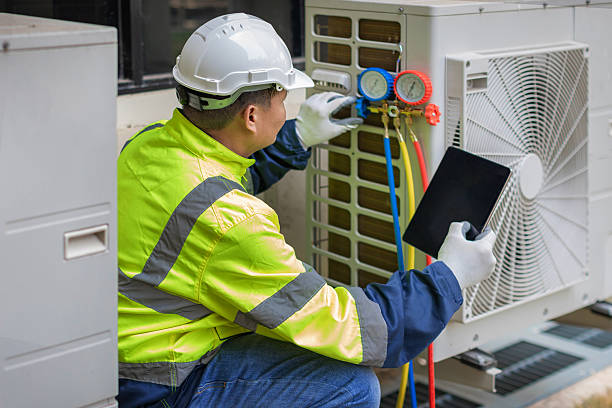 Professional Emergency Ac Repair technician working in Skaneateles Falls, NY